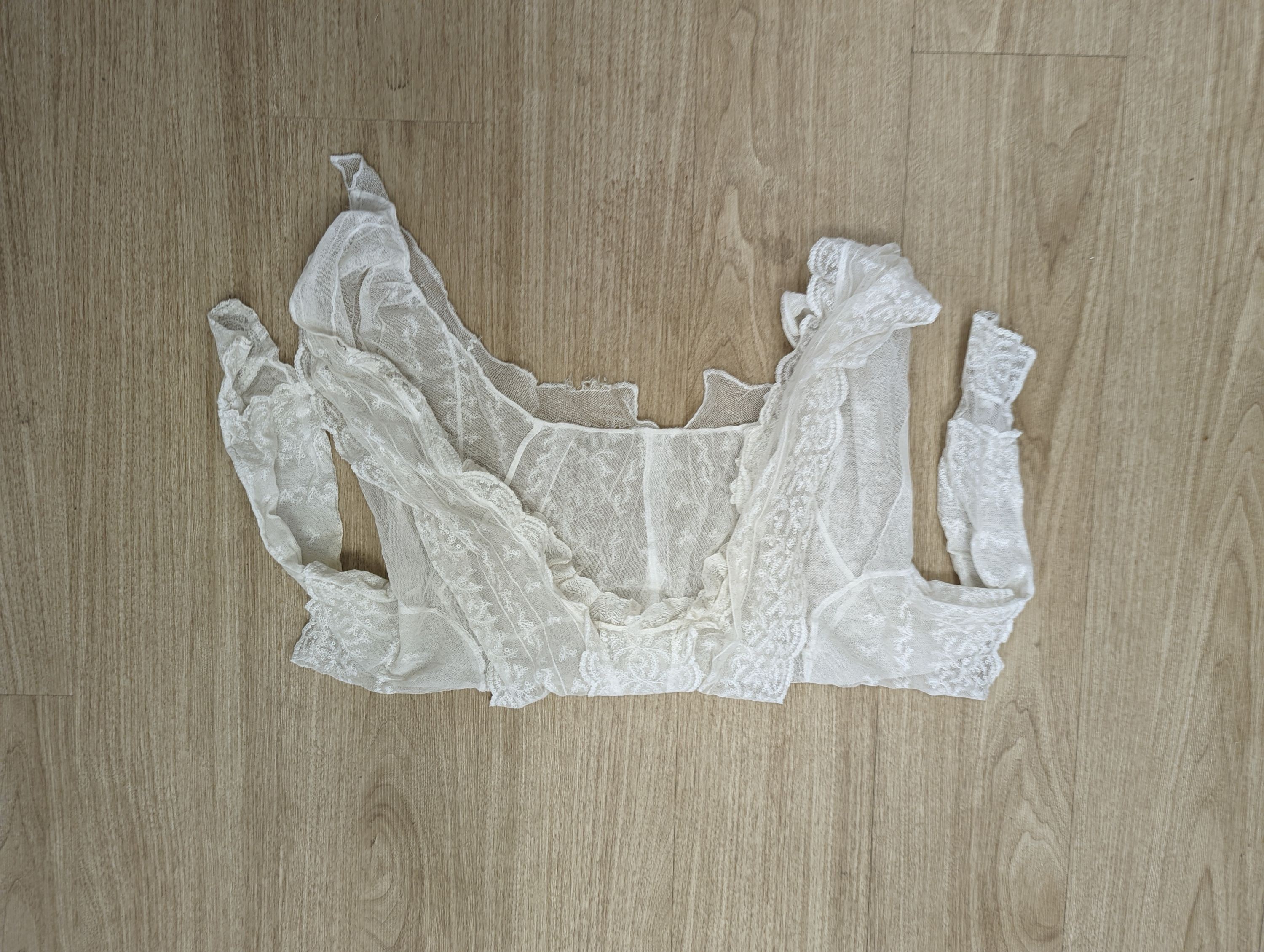 A lace jacket and five fine net and lace Edwardian ladies blouses.